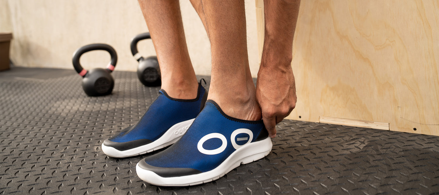 Male and Female Model wearing OOmg Sport Black
