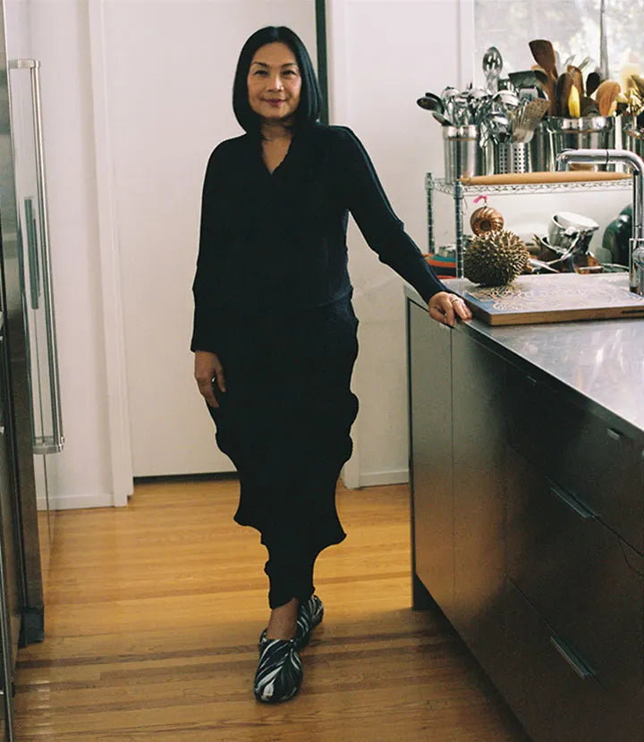 Nok Suntaranon wearing the TILIT x OOFOS limited-edition Off Hours clogs.