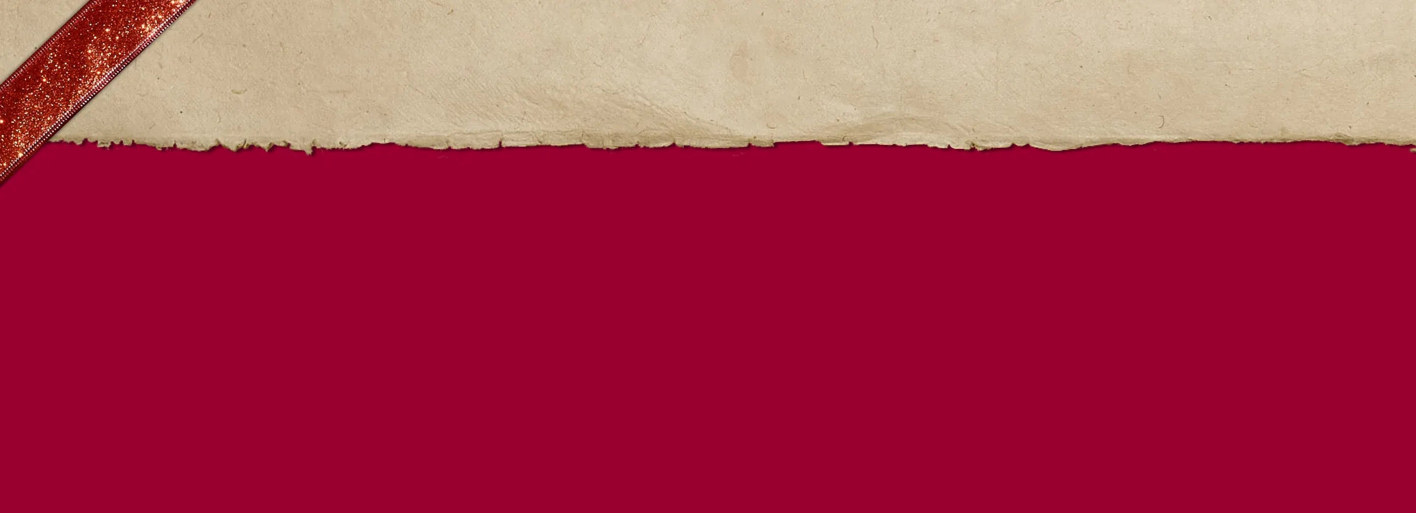 Torn piece of paper with a red ribbon on a red background
