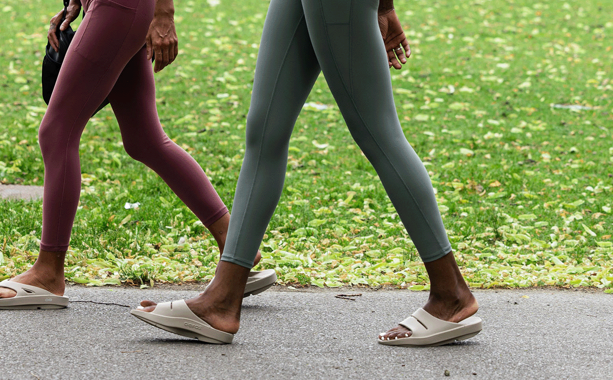 Women's OOahh Slide Sandal - Nomad models walking outside | lifestyle