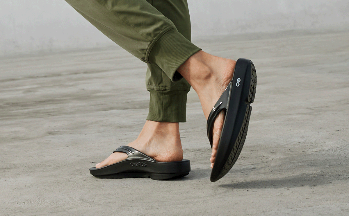 Women's OOlala Sandal - Black back view of model posing outside | lifestyle
