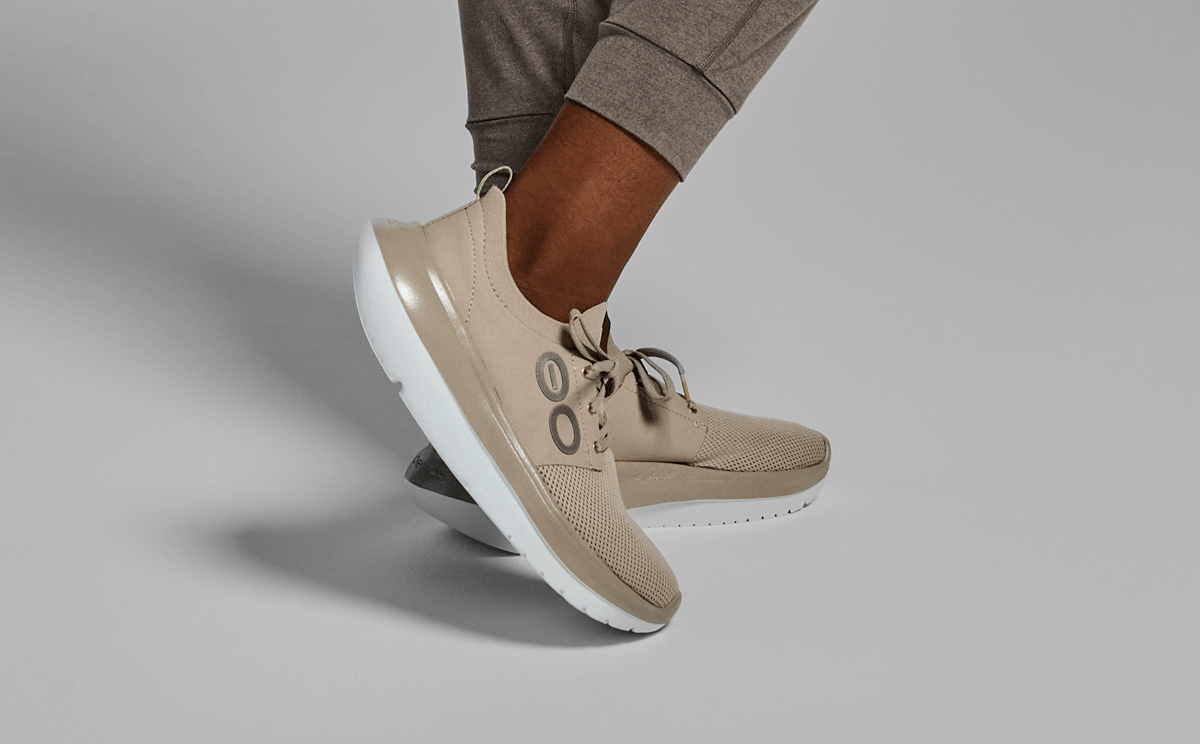 Women's OOmy Stride - Nomad model posing in studio | lifestyle