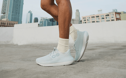 Men's OOmy Stride - Glacier side view of model standing outside | lifestyle