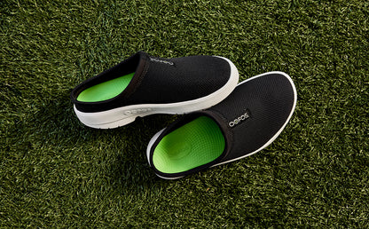 Men's OOcoozie Sport Mule - White Black top view of shoes on grass | lifestyle