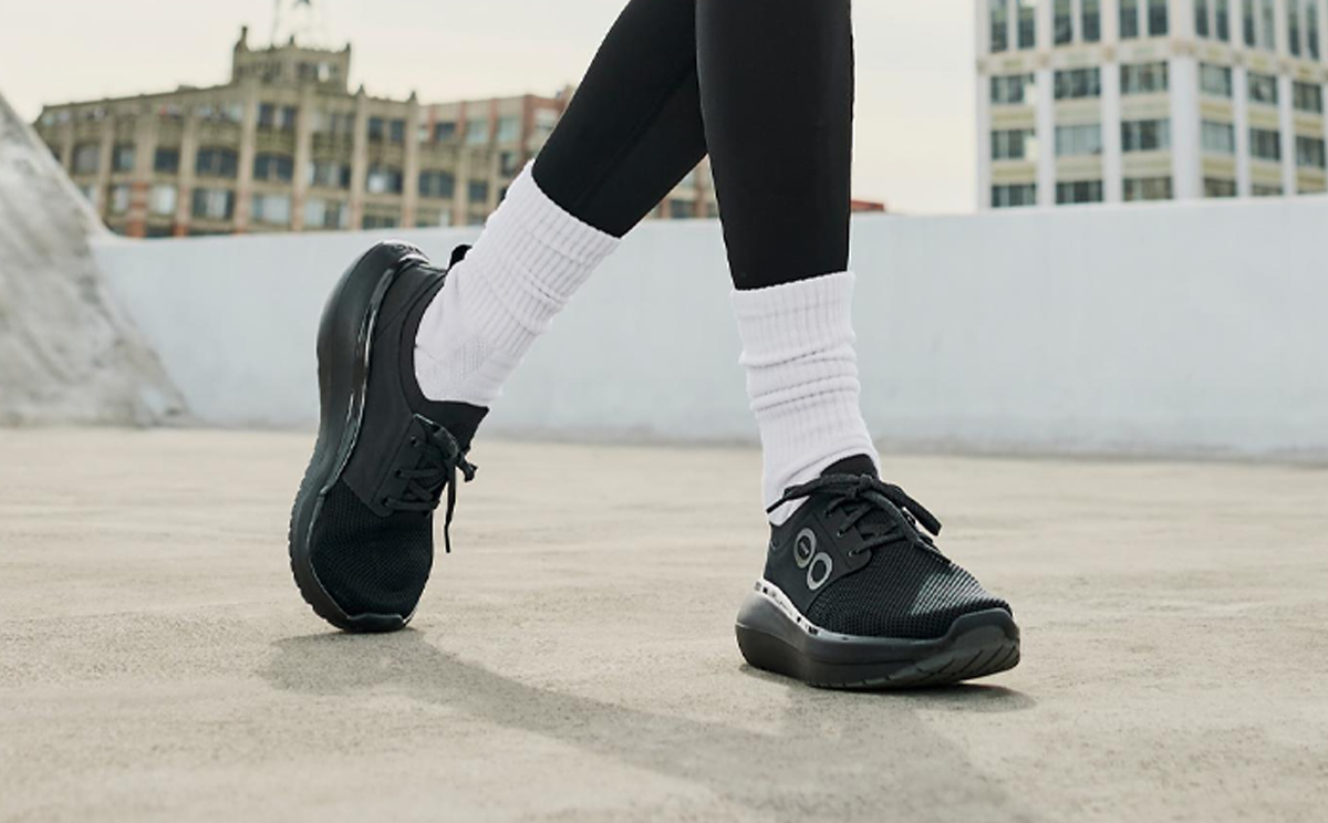 Women's OOmy Stride - Black model standing outside | lifestyle