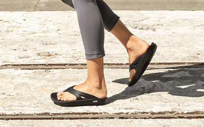 Women's OOriginal Sandal - Black model walking outside | lifestyle
