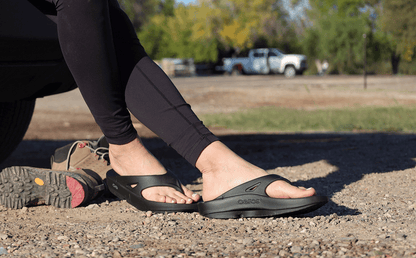Women's OOriginal Sandal - Black model sitting outside | lifestyle