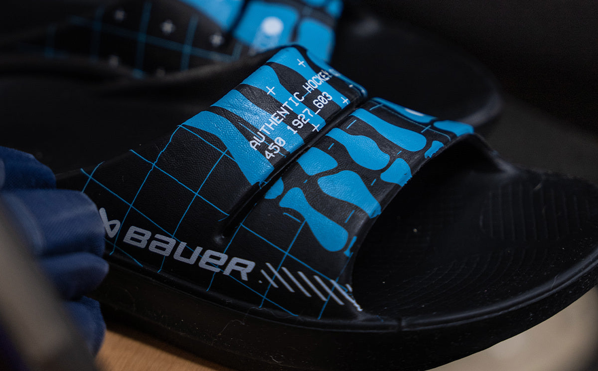 BAUER/OOFOS Men's OOahh Limited Slide Sandal Bauer Skeleton close up of skeleton pattern 