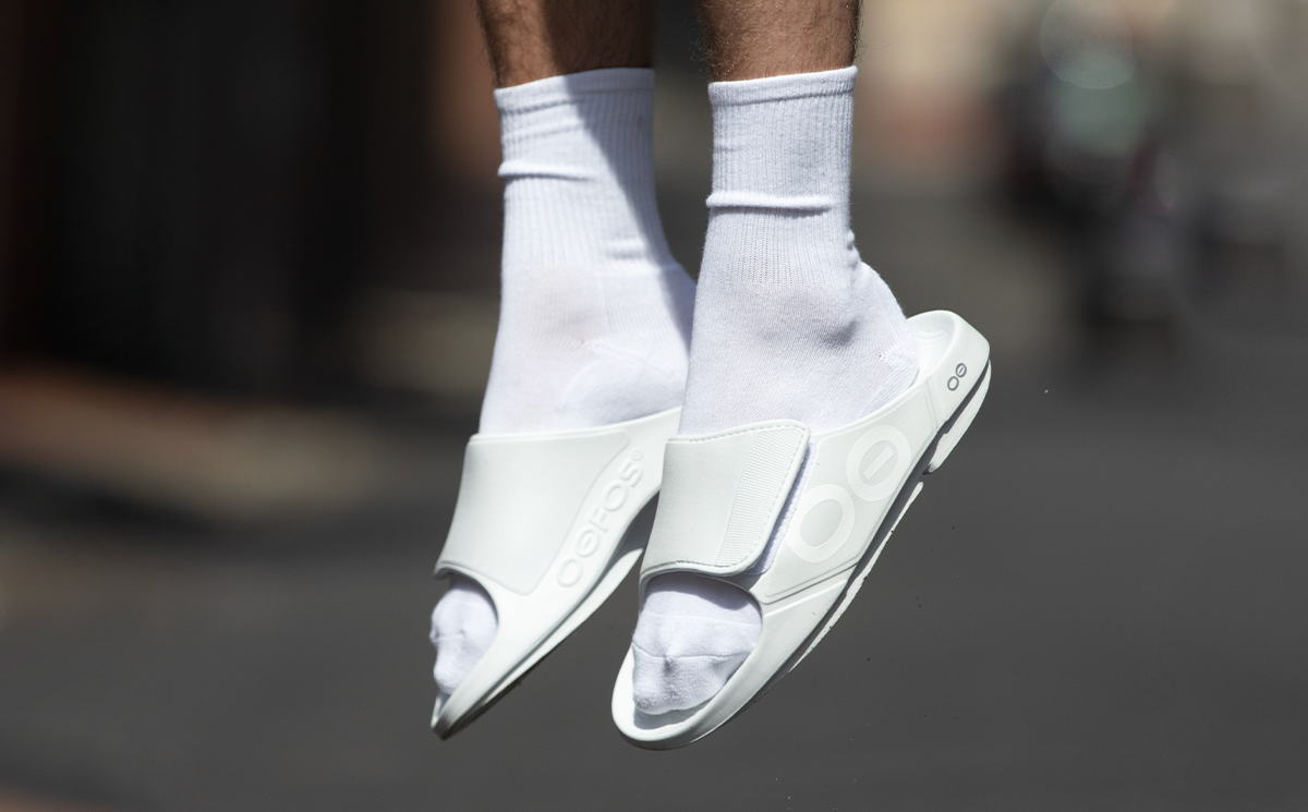 Men's OOahh Sport Flex Sandal - White close up side view of shoes on model | lifestyle