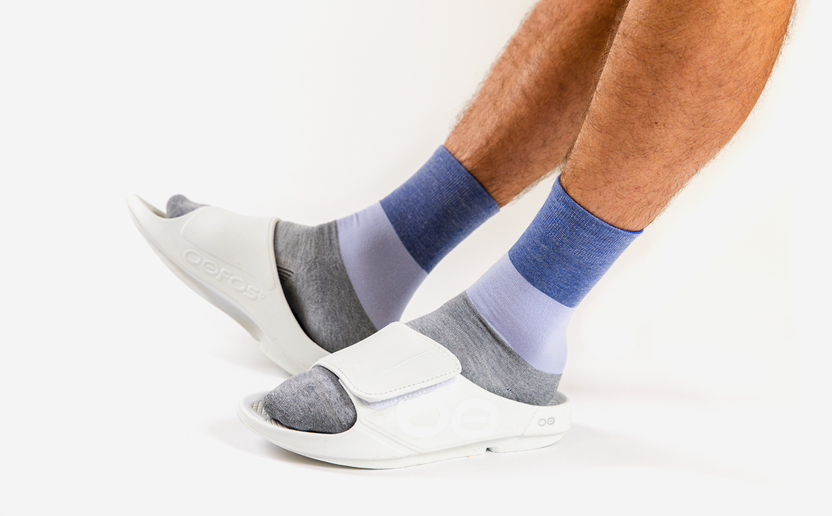 Men's OOahh Sport Flex Sandal - White studio image of model in shoes | lifestyle