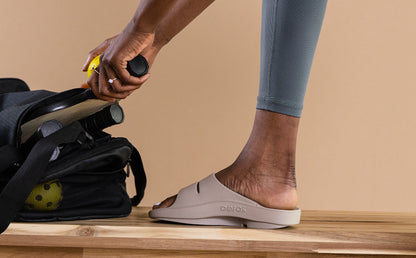 Women's OOahh Slide Sandal - Nomad studio close up of shoe on model | lifestyle